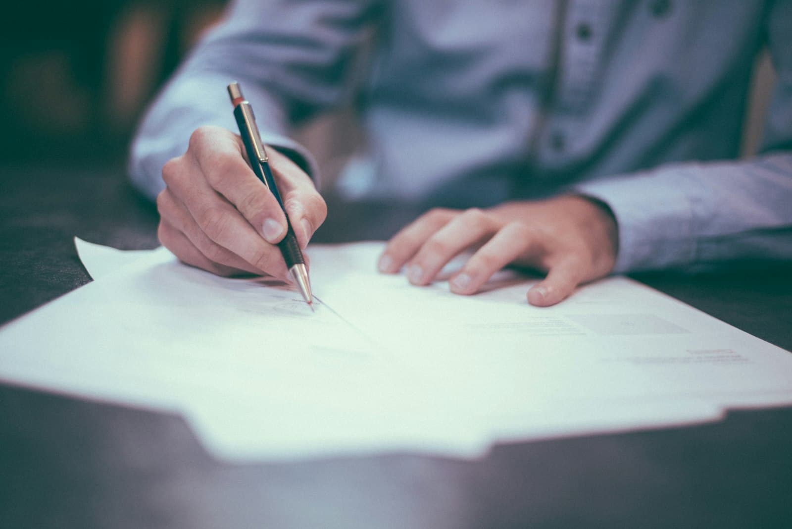 Signing official documents with a pen