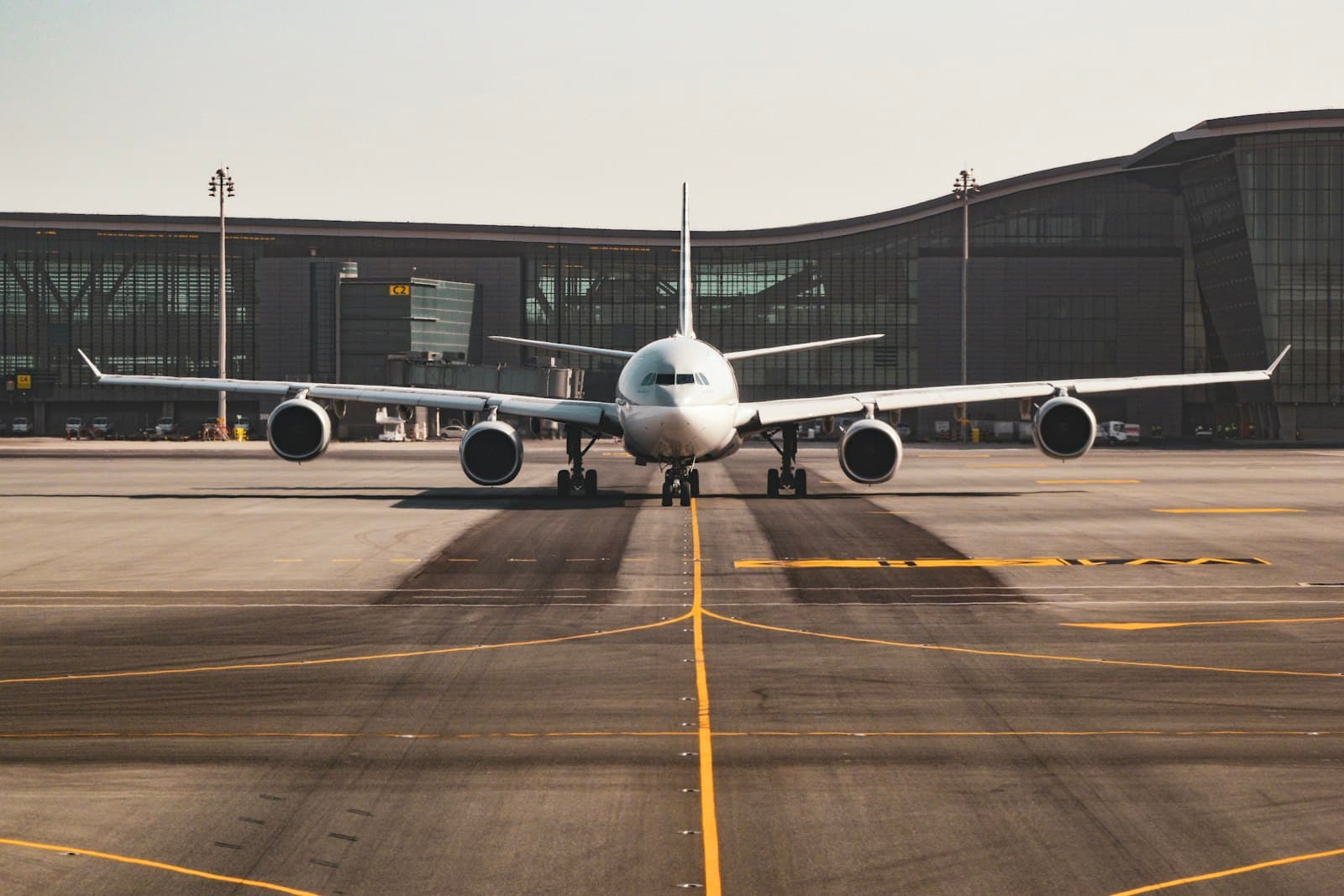 Airplanes parked at an airport terminal